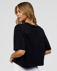 Woman wearing Go-To FLXCotton Skimmer Tee - Black-Black | Model:Leilani | Size:XS | Thumbnail Index: 2