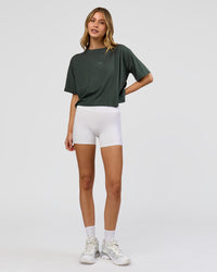 Woman wearing Go-To FLXCotton Skimmer Tee - Carbon Green-Carbon Green | Model:Leilani | Size:XS | Thumbnail Index: 4