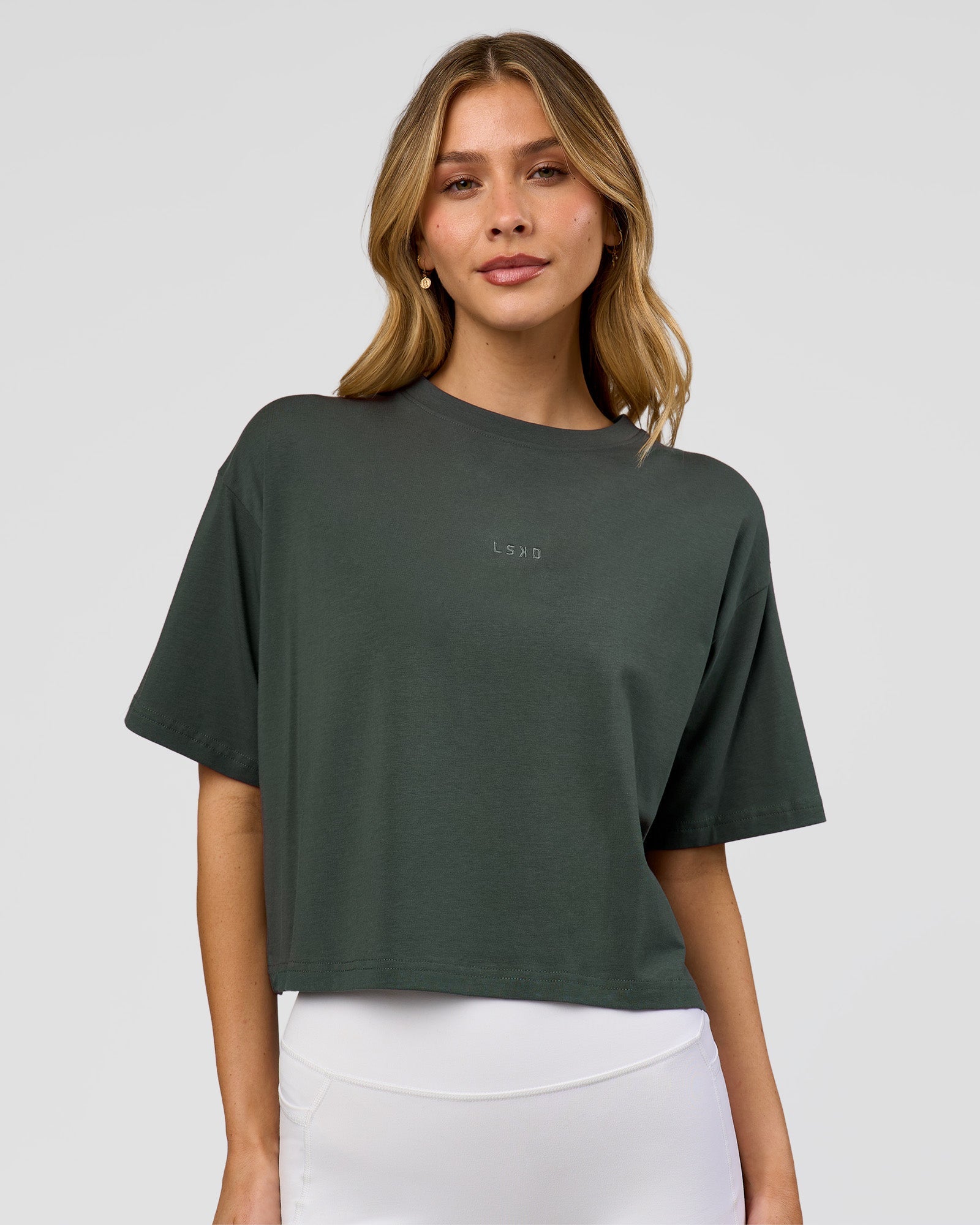 Woman wearing Go-To FLXCotton Skimmer Tee - Carbon Green-Carbon Green | Model:Leilani | Size:XS