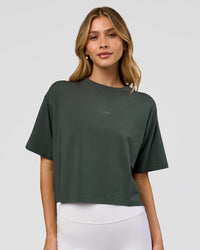 Woman wearing Go-To FLXCotton Skimmer Tee - Carbon Green-Carbon Green | Model:Leilani | Size:XS | Thumbnail Index: 0