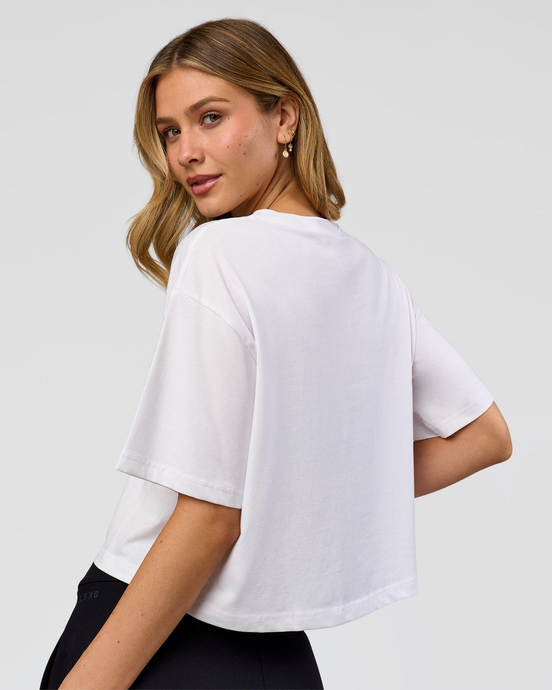 Woman wearing Go-To FLXCotton Skimmer Tee - White-White | Model:Leilani | Size:XS - view 3