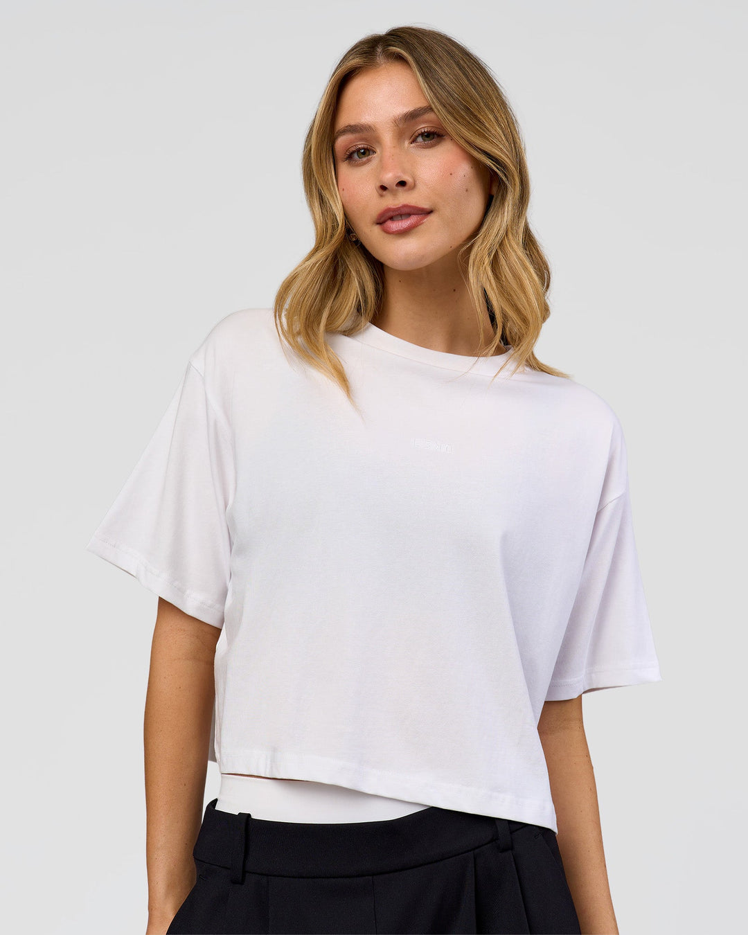 Woman wearing Go-To FLXCotton Skimmer Tee - White-White | Model:Leilani | Size:XS - view 1