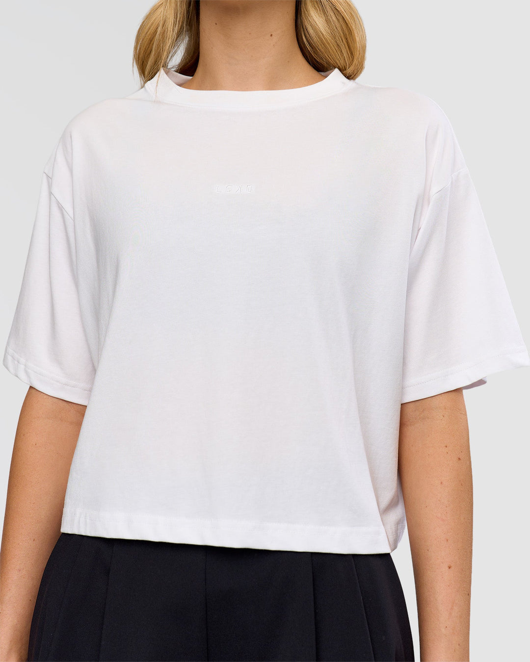 Woman wearing Go-To FLXCotton Skimmer Tee - White-White | Model:Leilani | Size:XS - view 5