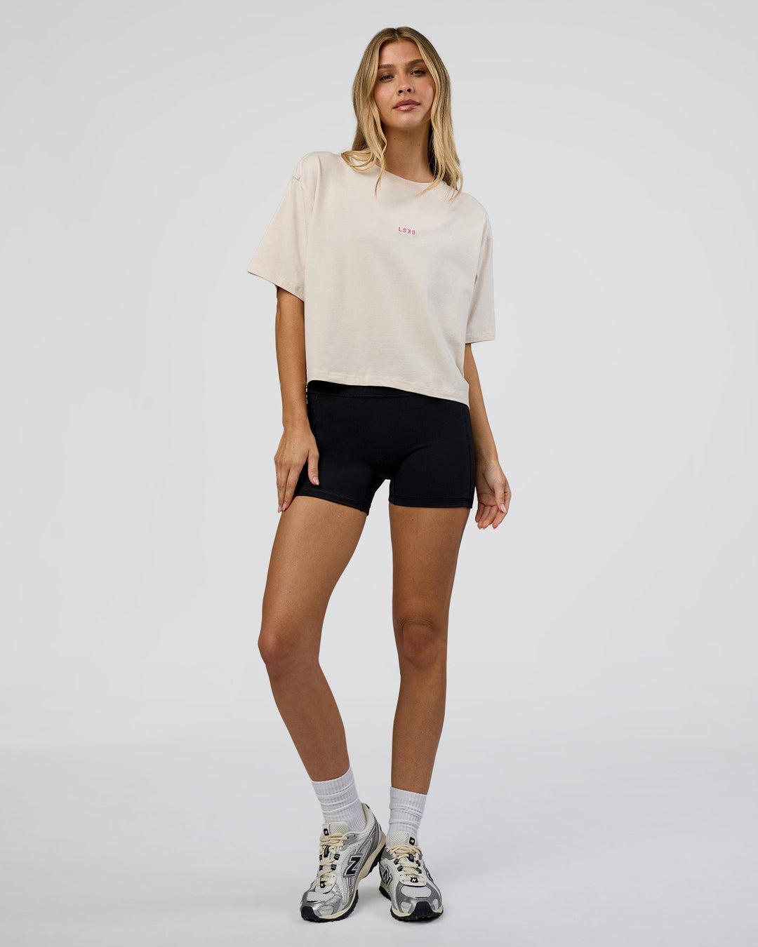 Woman wearing Go-To Heavy Weight FLXCotton Graphic Skimmer Tee - Off White-Multi | Model:Leilani | Size:XS