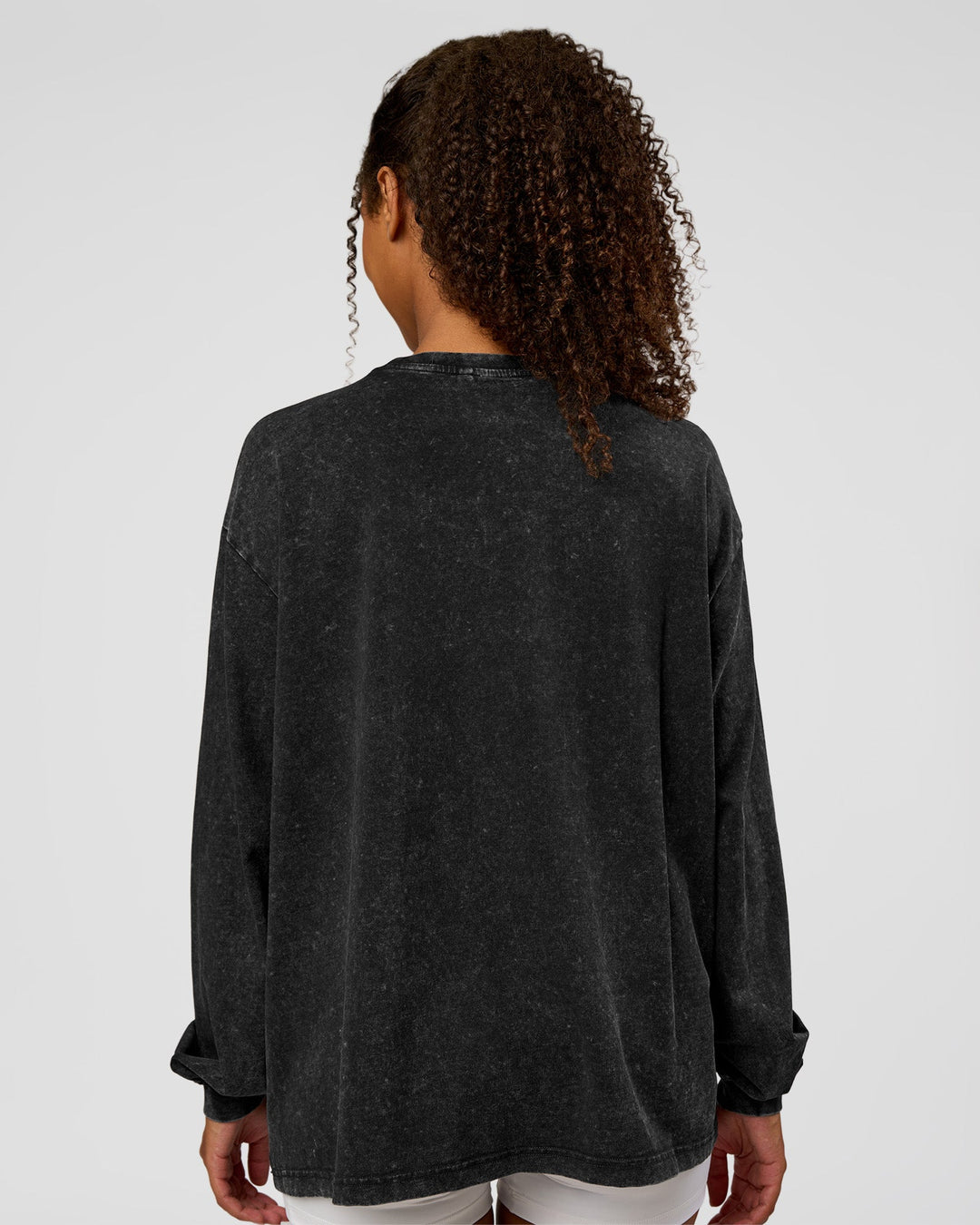 Woman wearing Go-To Long Sleeve FLXCotton Oversized Tee - Black Washed-White | Model:Jordan | SIze:XS