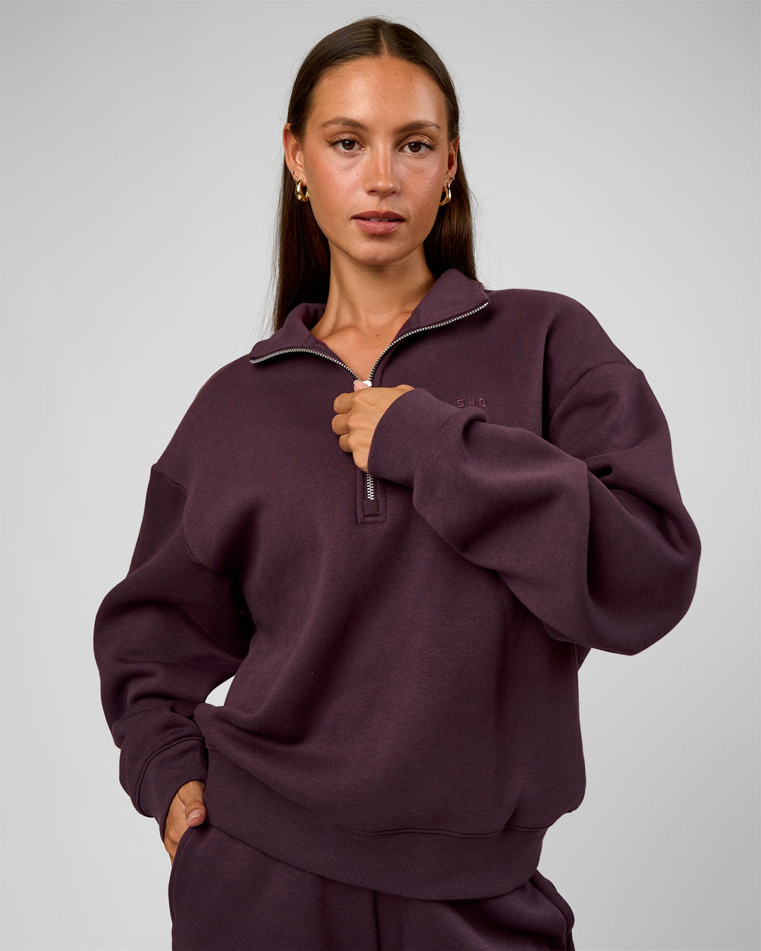 Woman wearing Go-To Oversized Quarter Zip Sweater - Midnight Plum | Model:Brylee | Size:XS - view 3