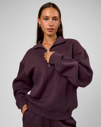 Woman wearing Go-To Oversized Quarter Zip Sweater - Midnight Plum | Model:Brylee | Size:XS | Thumbnail Index: 2