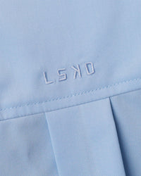 Woman wearing Go-To Oversized Shirt - Poplin Blue | Model:Leilani | Size:XS | Thumbnail Index: 6