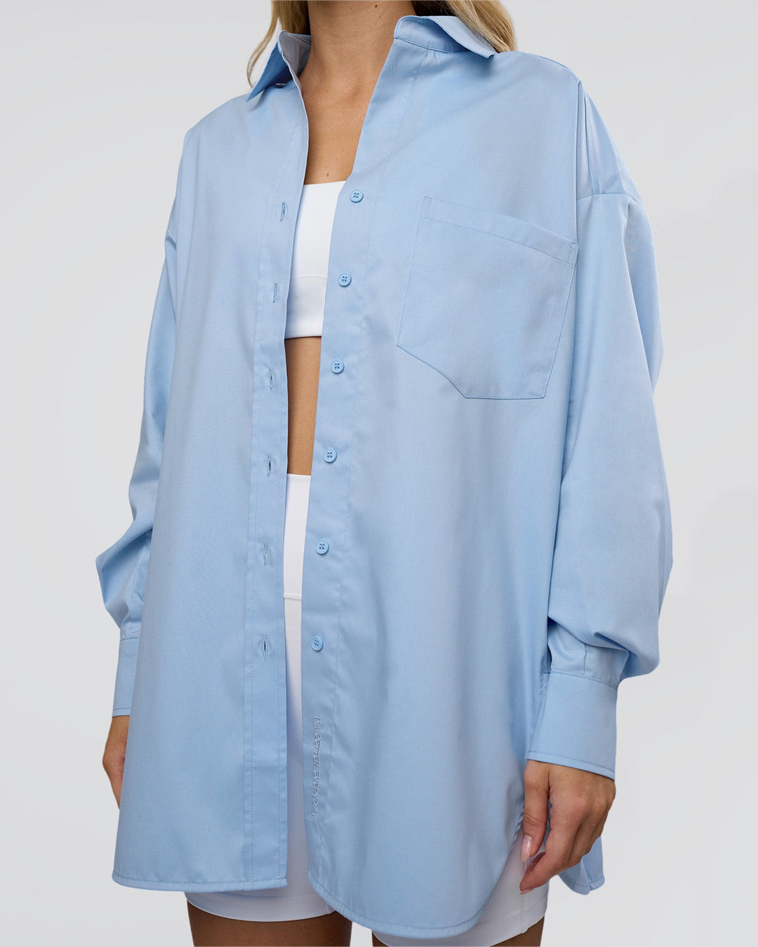 Woman wearing Go-To Oversized Shirt - Poplin Blue | Model:Leilani | Size:XS - view 11