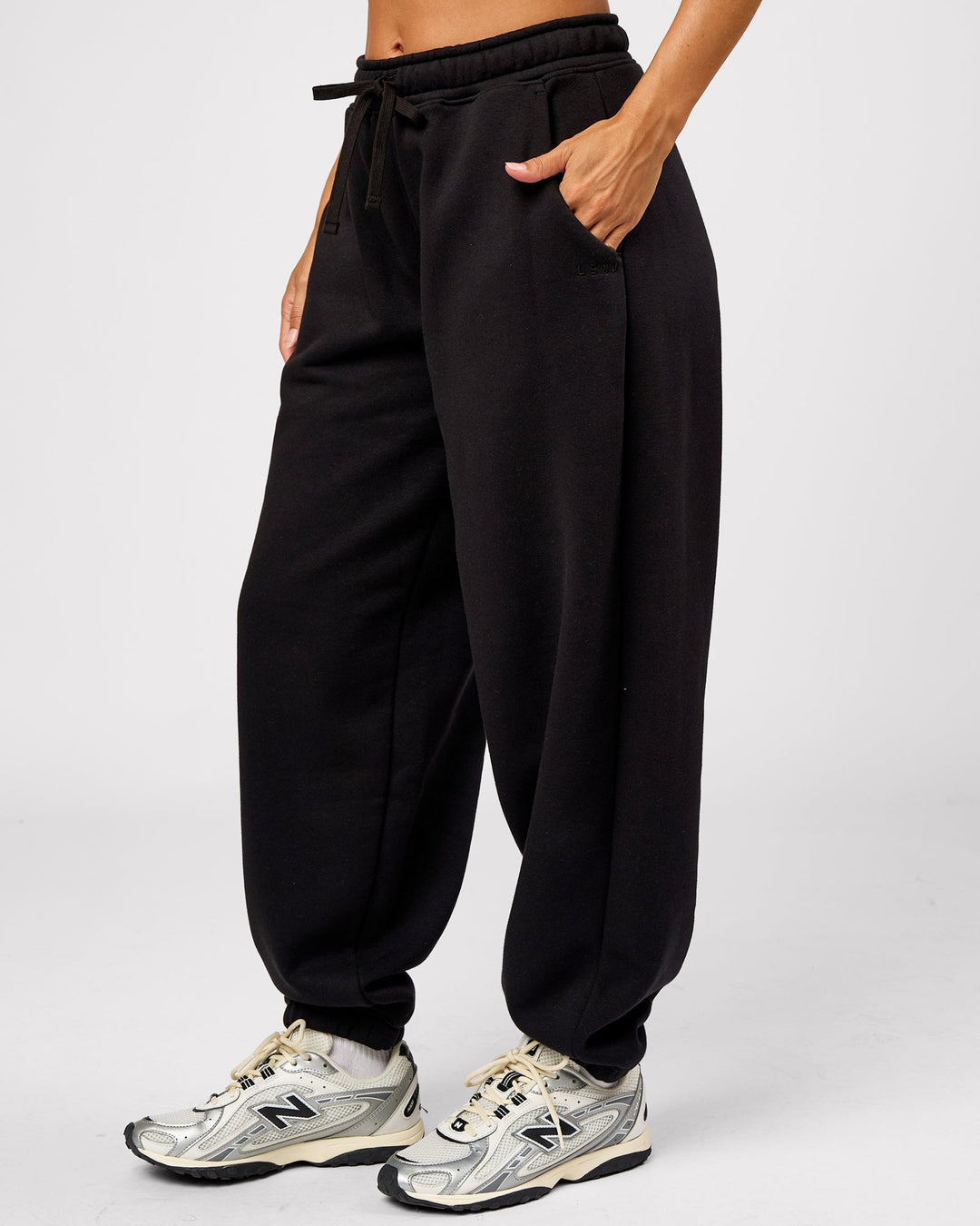 Woman wearing Go-To Oversized Track Pant - Black | Model:Brylee | Size:XS - view 7