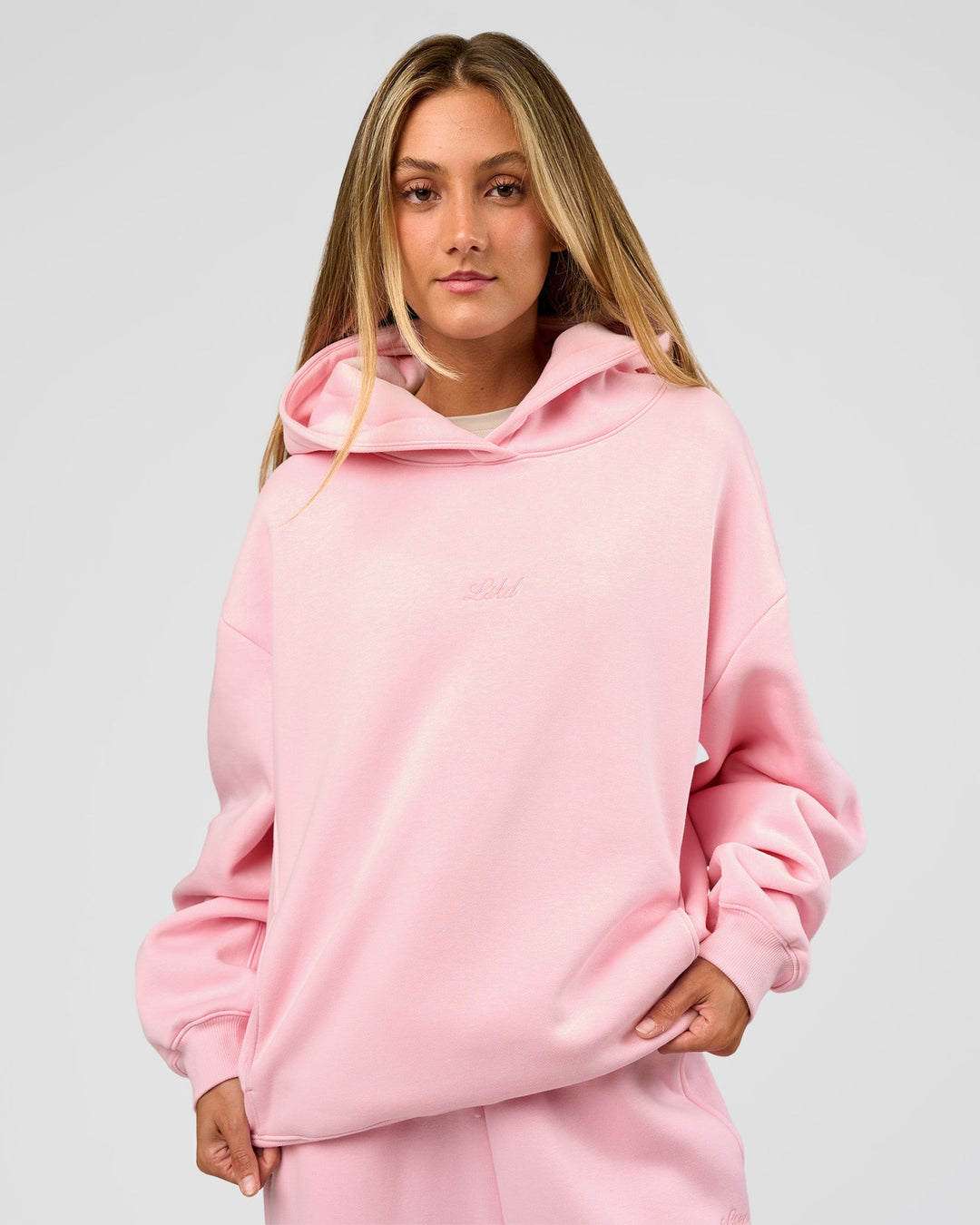 Woman wearing Go-To Script Oversized Hoodie - Marshmallow | Model:Georgia | Size:XS