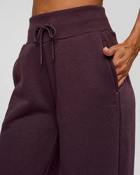Woman wearing Go-To Wide Leg Track Pant - Midnight Plum | Model:Rhiley | Size:XS | Thumbnail Index: 8