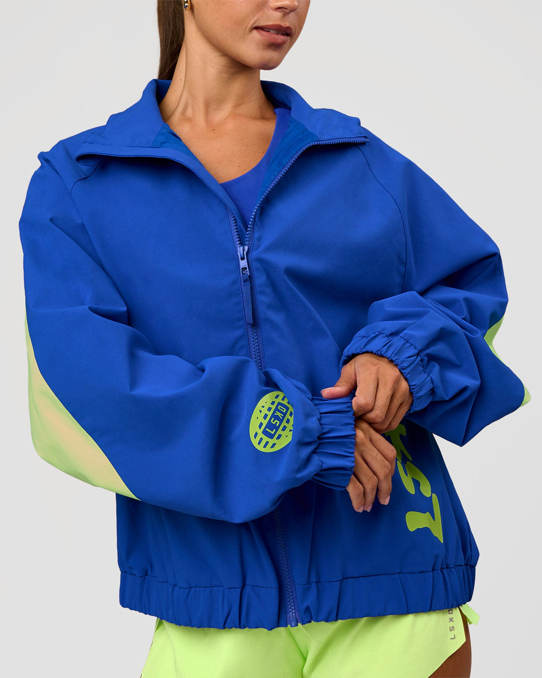 Woman wearing Hype Oversized Track Jacket - Electric Indigo | Model:Brylee | Size:XS - view 3