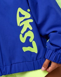 Woman wearing Hype Oversized Track Jacket - Electric Indigo | Model:Brylee | Size:XS | Thumbnail Index: 11