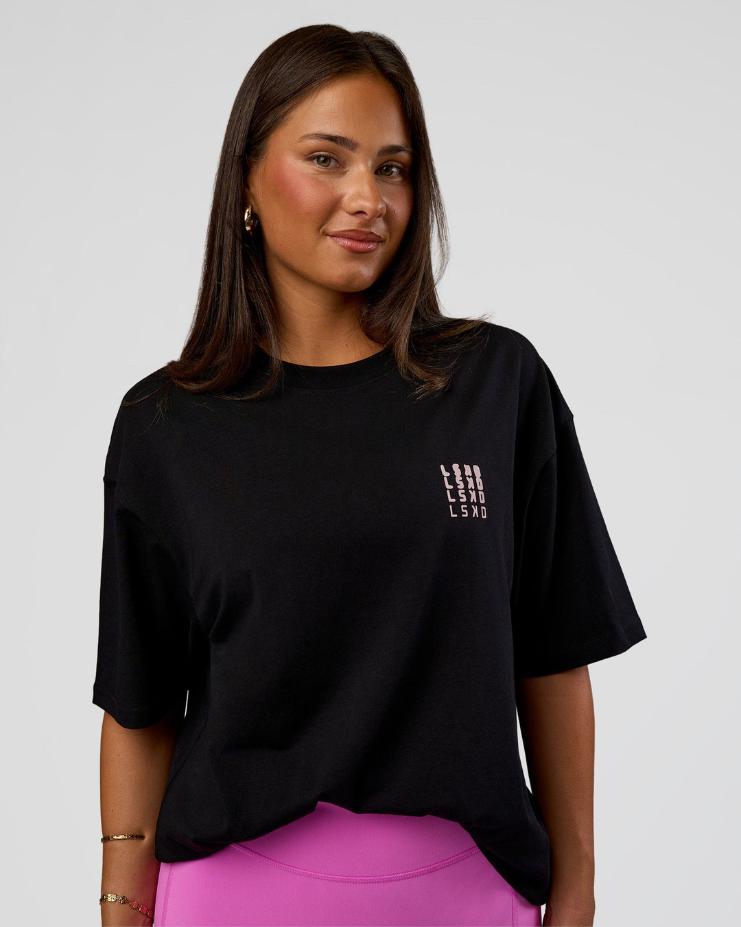 Woman wearing Inferno Journey FLXCotton Oversized Tee - Black-Ultra Fuchsia | Model:Bianca | Size:XS