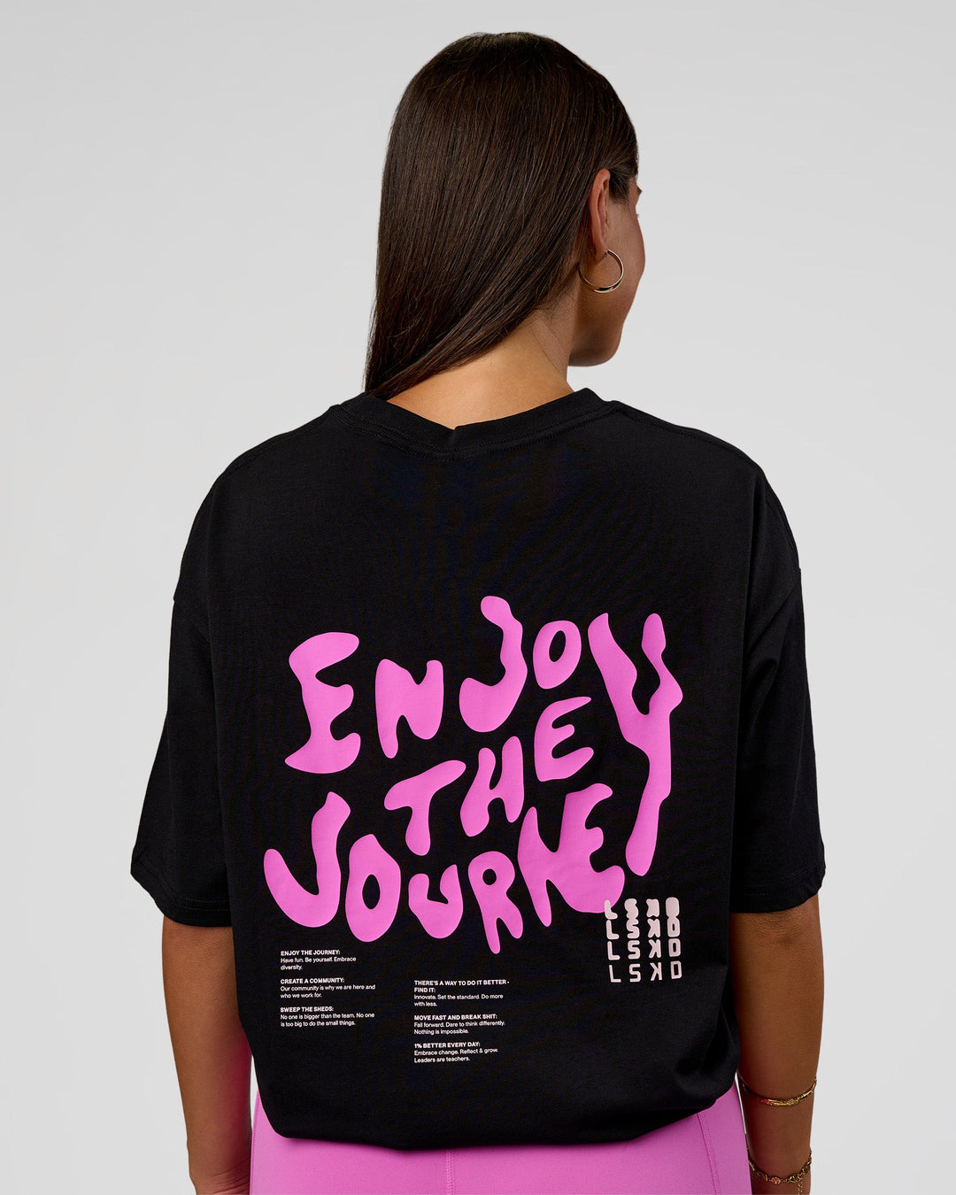 Woman wearing Inferno Journey FLXCotton Oversized Tee - Black-Ultra Fuchsia | Model:Bianca | Size:XS
