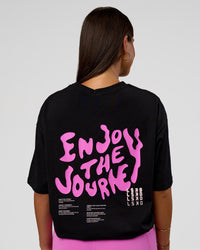Woman wearing Inferno Journey FLXCotton Oversized Tee - Black-Ultra Fuchsia | Model:Bianca | Size:XS