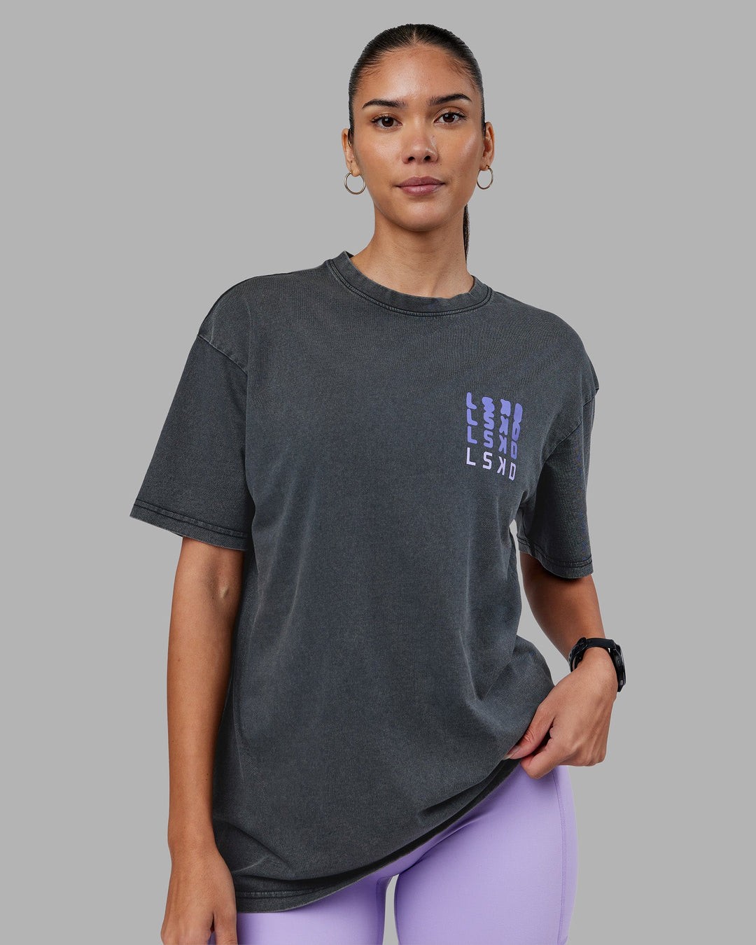 Woman wearing Inferno Journey FLXCotton Oversized Tee - Black Washed-Violet Ray | Model:Rhiley | Size:XS