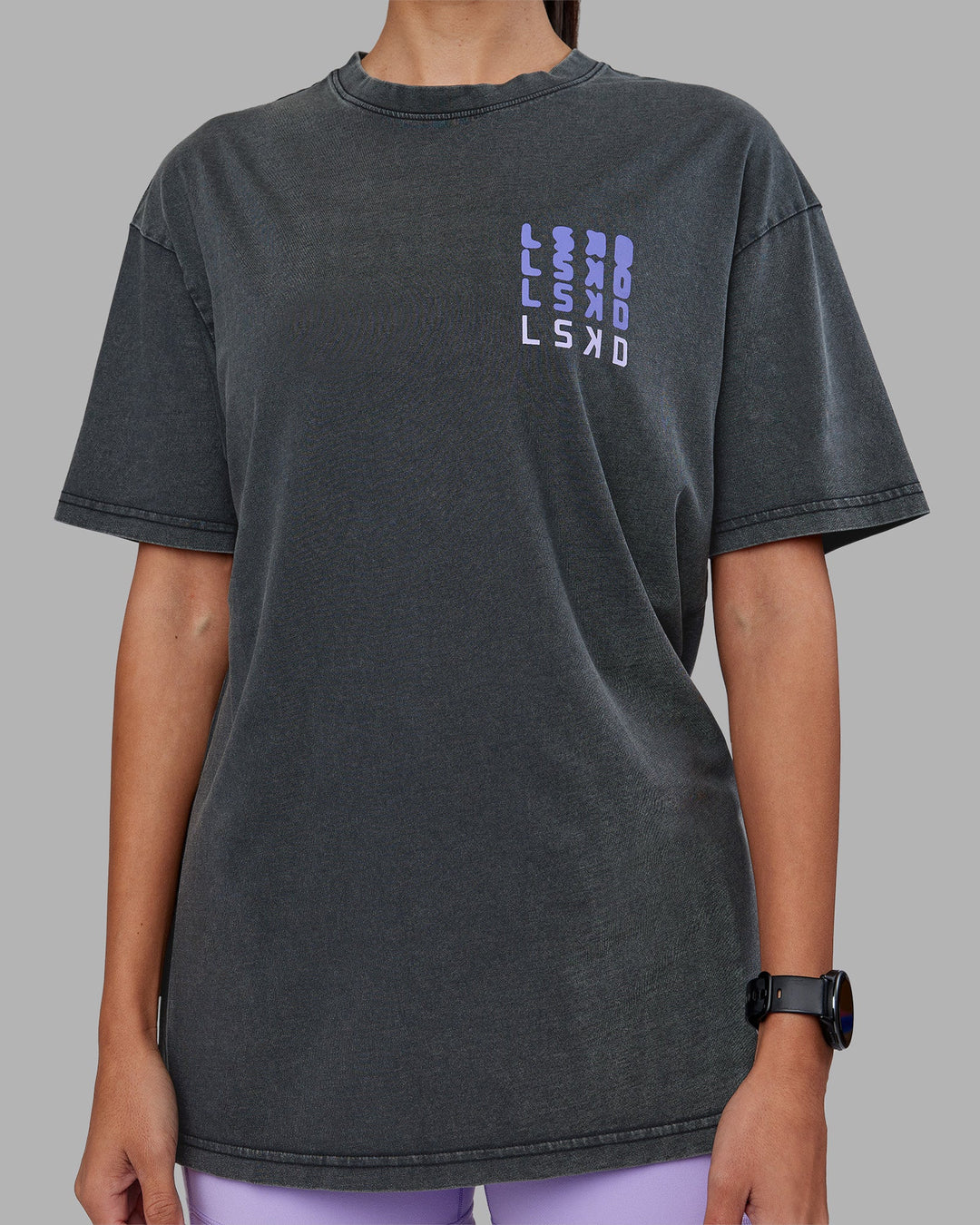 Woman wearing Inferno Journey FLXCotton Oversized Tee - Black Washed-Violet Ray | Model:Rhiley | Size:XS