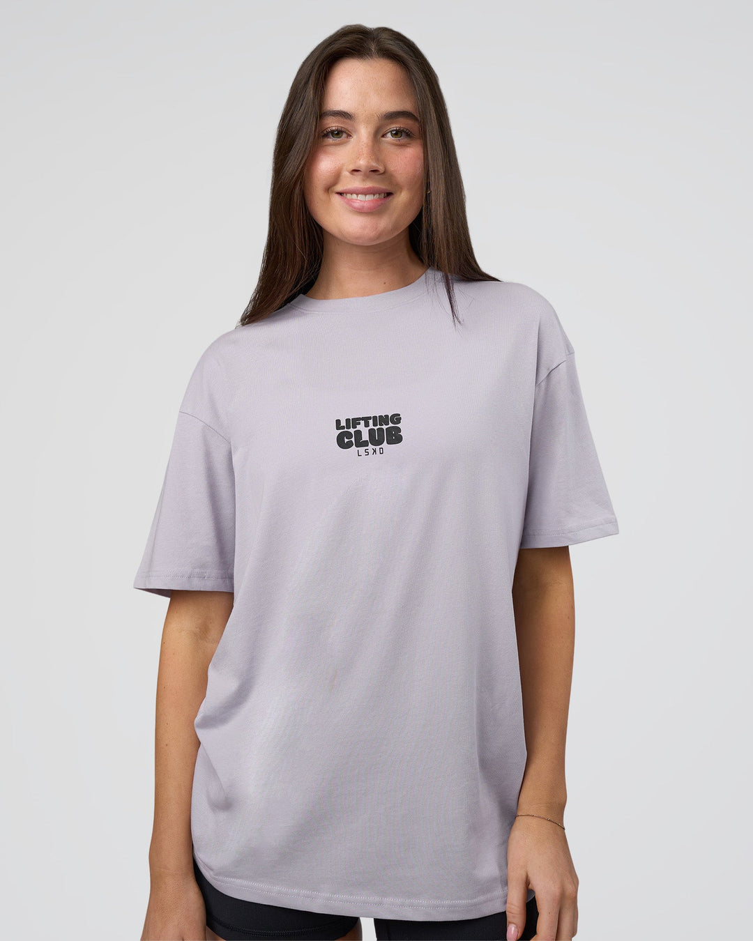 Woman wearing Kettle B FLXCotton Oversized Tee - Galactic Lilac-Black | Model:Estella | Size:XS