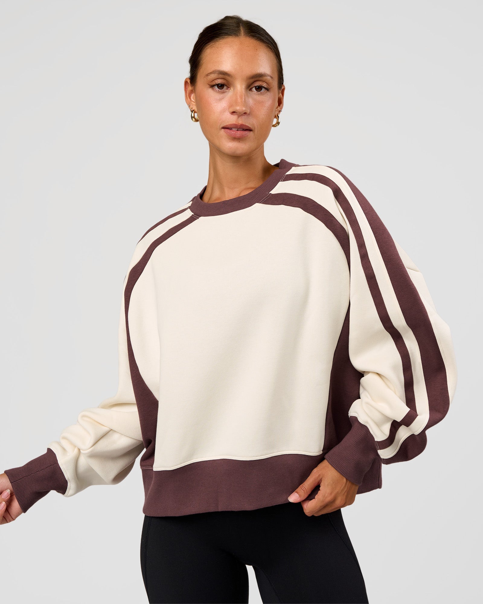 Woman wearing LSKD Fitness Club Oversized Sweater - Off White-Cocoa Powder | Model:Brylee | Size:XS