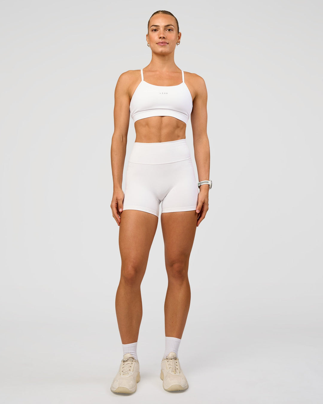 Woman wearing Lift Sports Bra - White | Model:Maja | Size:XS
