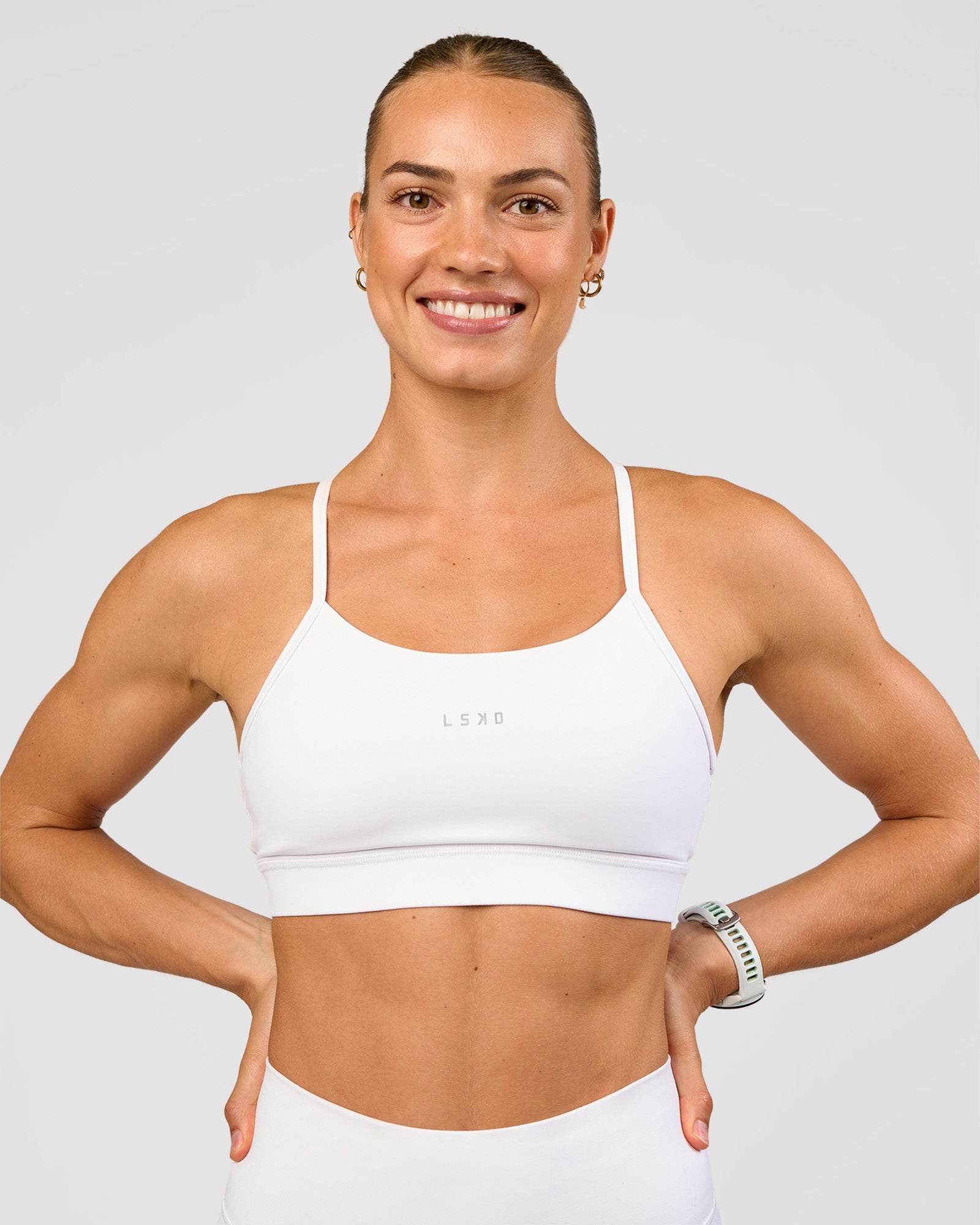 Woman wearing Lift Sports Bra - White | Model:Maja | Size:XS