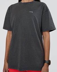 Woman wearing Lifting FLXCotton Oversized Tee - Black Washed-Flame | Model:Rhiley | Size:XS