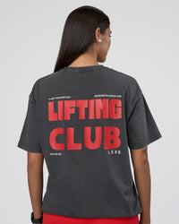 Woman wearing Lifting FLXCotton Oversized Tee - Black Washed-Flame | Model:Rhiley | Size:XS