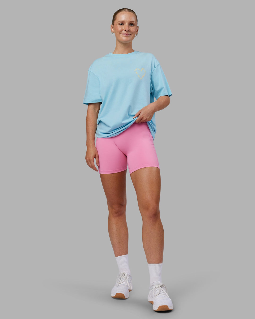 Woman wearing Love The Process FLXCotton Oversize Tee - Crystal Blue-Lemon | Model:Neve | Size:XS