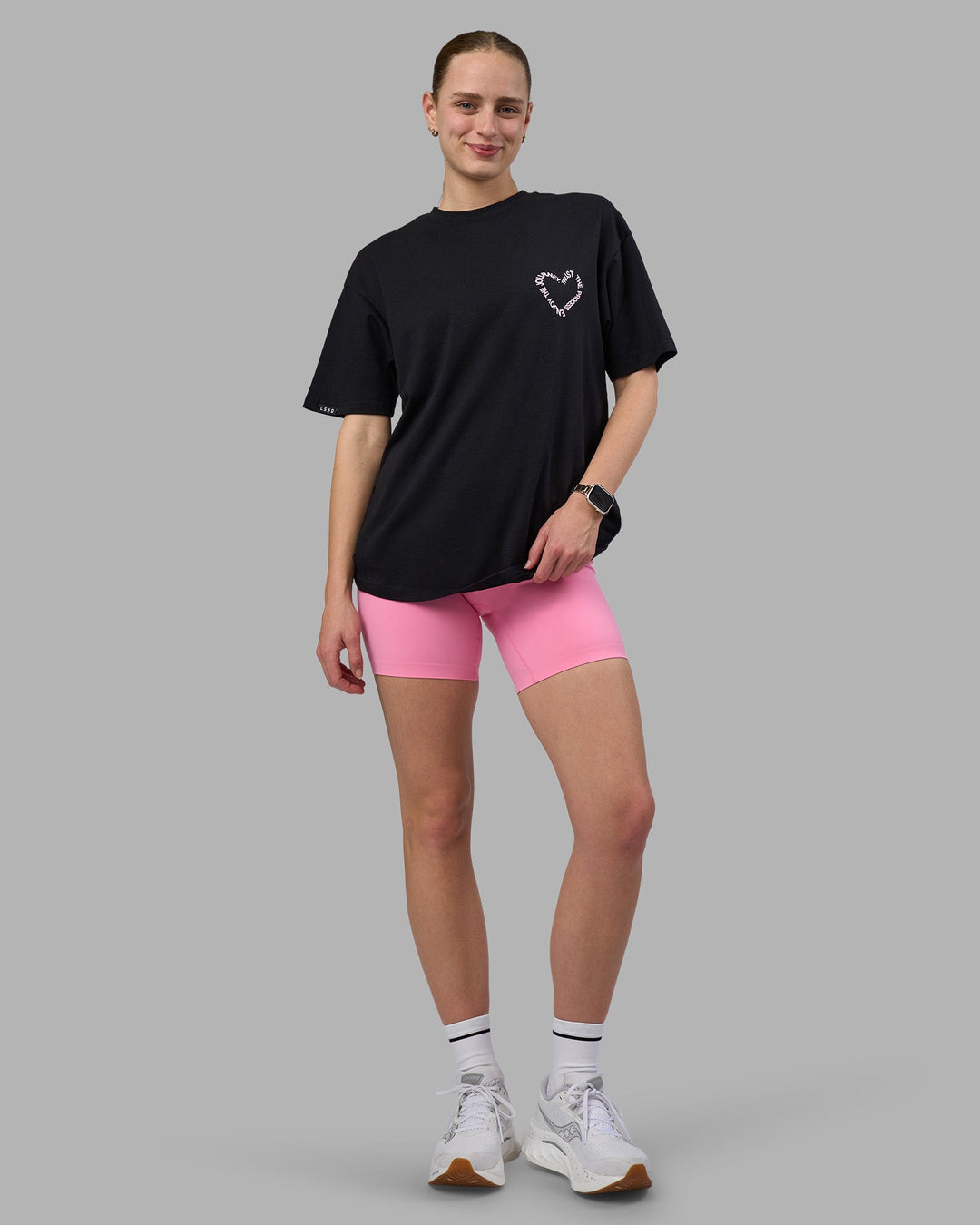 Woman wearing Love The Process FLXCotton Oversize Tee - Black-Bubblegum | Model:Lillie | Size:XS