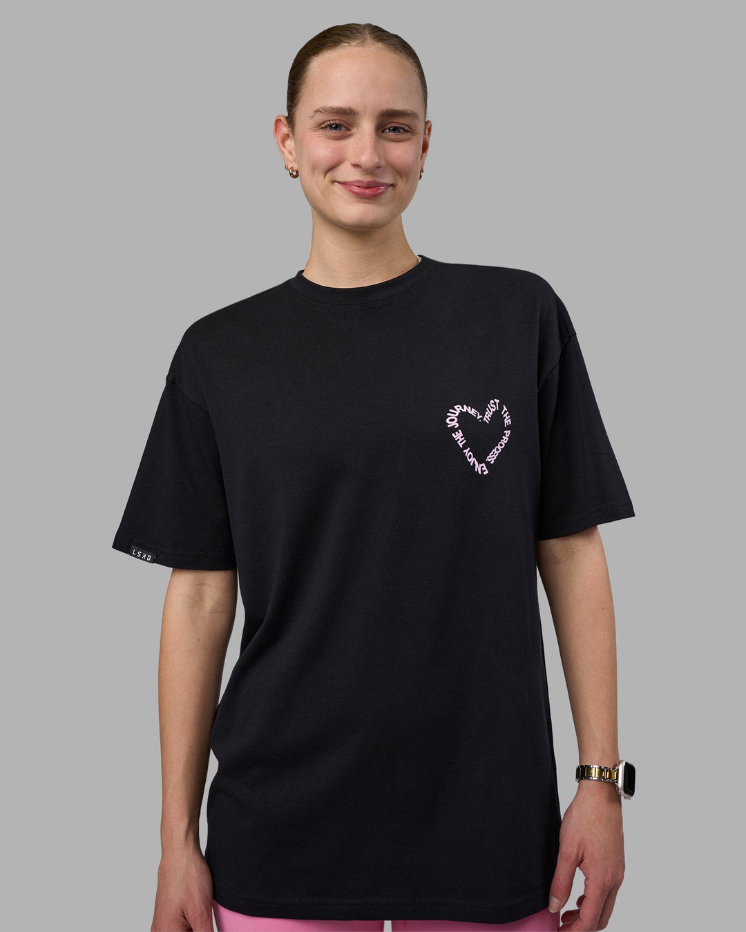 Woman wearing Love The Process FLXCotton Oversize Tee - Black-Bubblegum | Model:Lillie | Size:XS