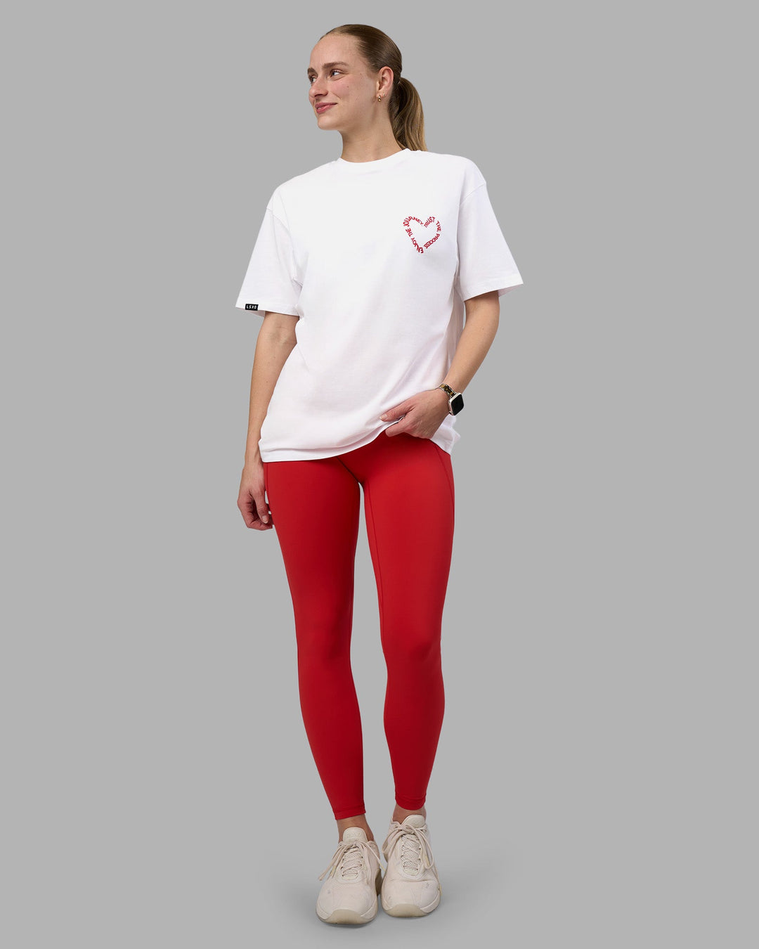 Woman wearing Love The Process FLXCotton Oversize Tee - White-Scarlet | Model:Lillie | Size:XS