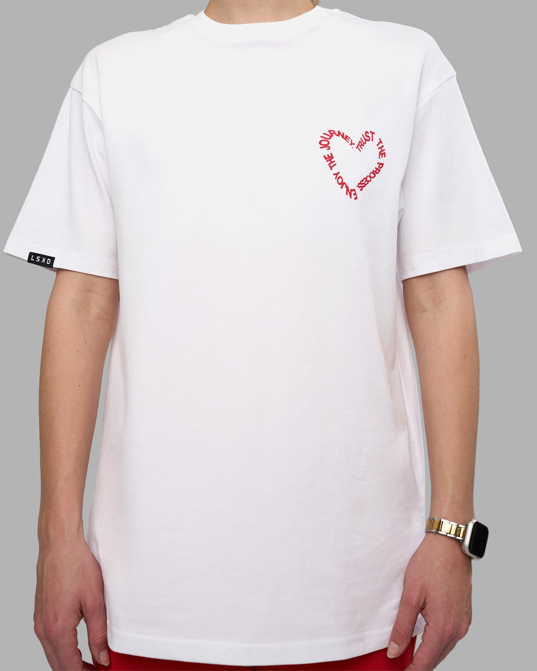 Woman wearing Love The Process FLXCotton Oversize Tee - White-Scarlet | Model:Lillie | Size:XS