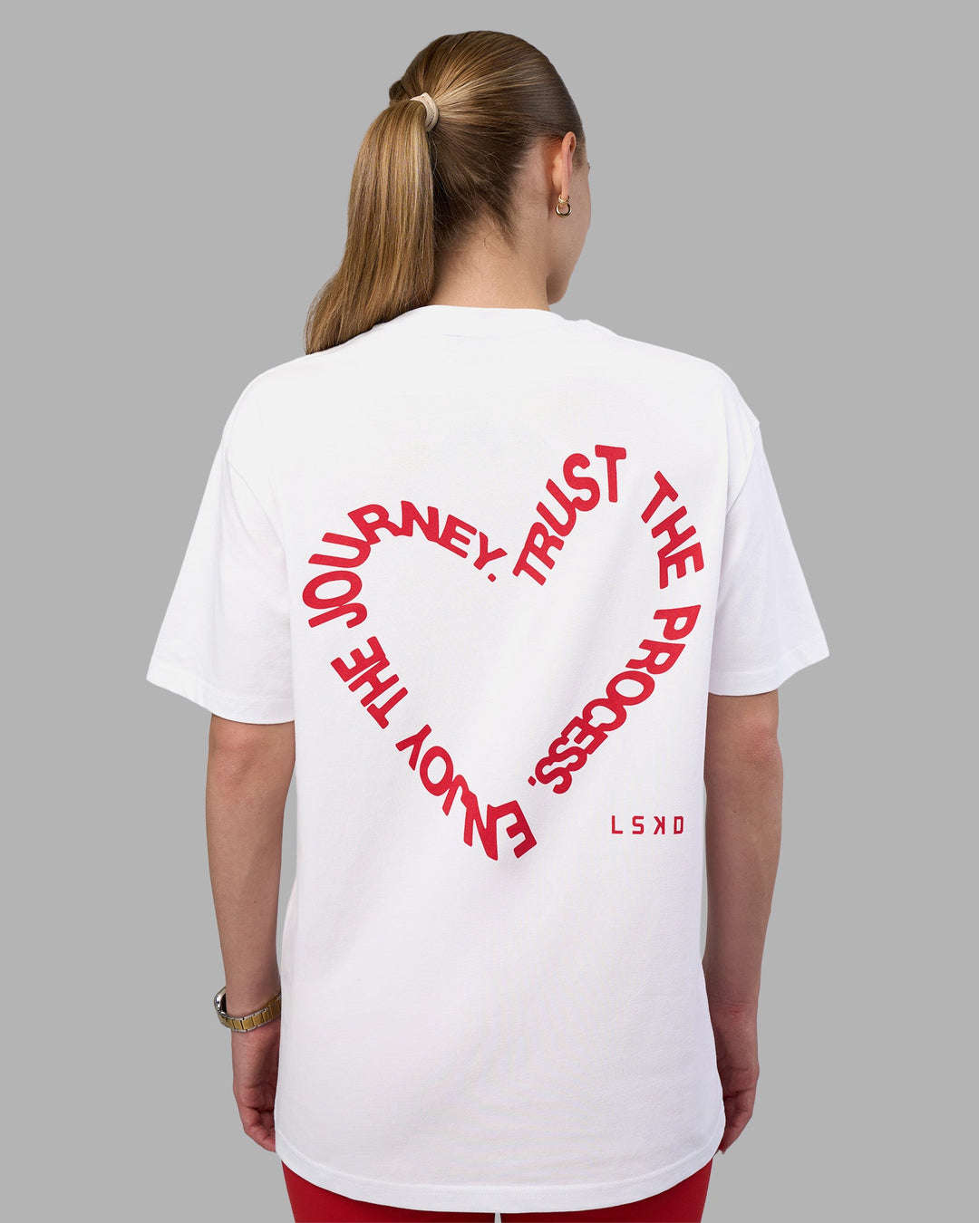 Woman wearing Love The Process FLXCotton Oversize Tee - White-Scarlet | Model:Lillie | Size:XS