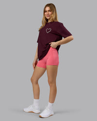 Woman wearing Love The Process FLXCotton Oversize Tee - Cherry Lacquer-Shale Beige | Model:Emilie | Size:XS