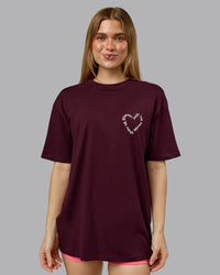 Woman wearing Love The Process FLXCotton Oversize Tee - Cherry Lacquer-Shale Beige | Model:Emilie | Size:XS