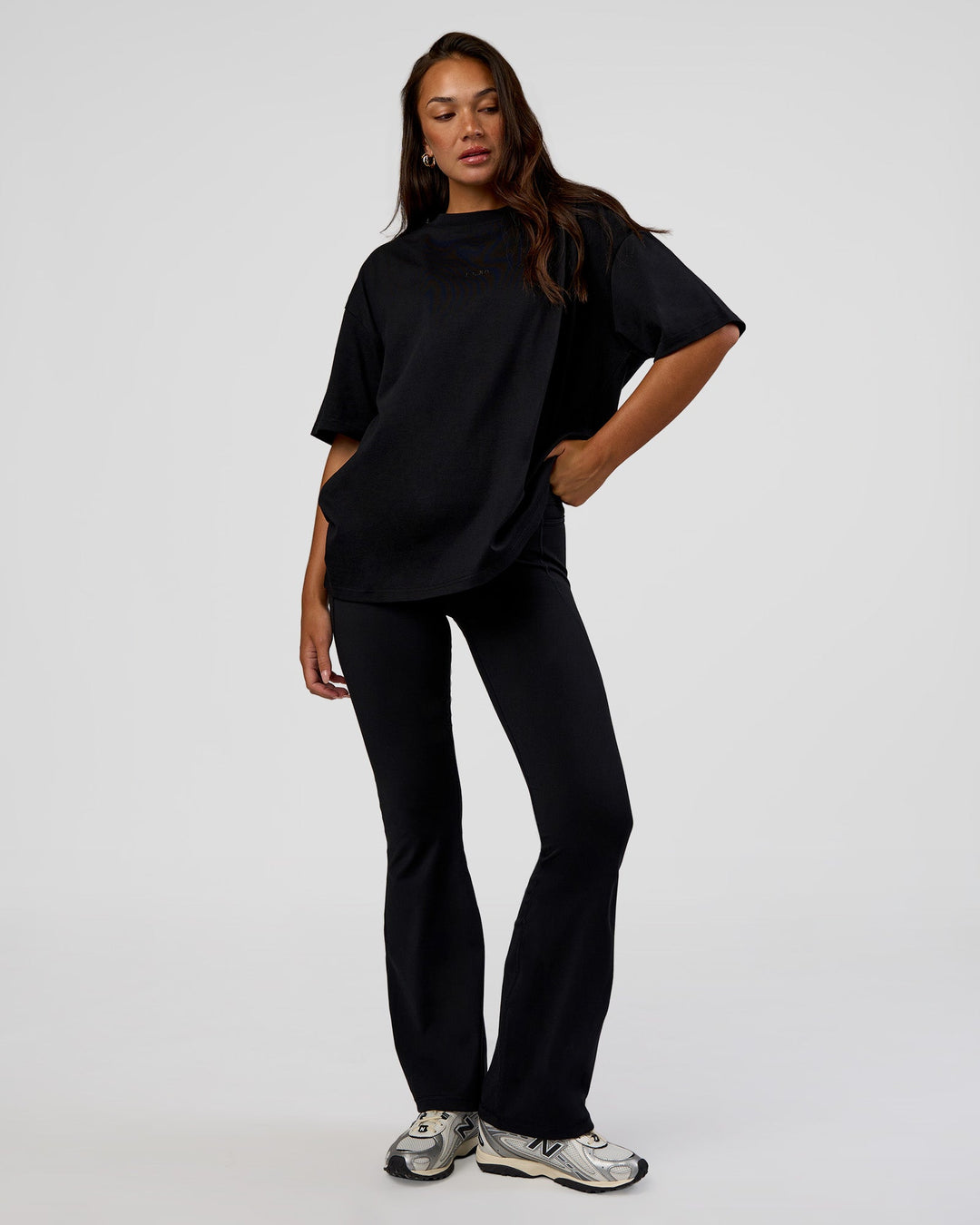 Woman wearing MVP 2.0 Oversized Tee - Black | Model:Kirstyn | Size:XS