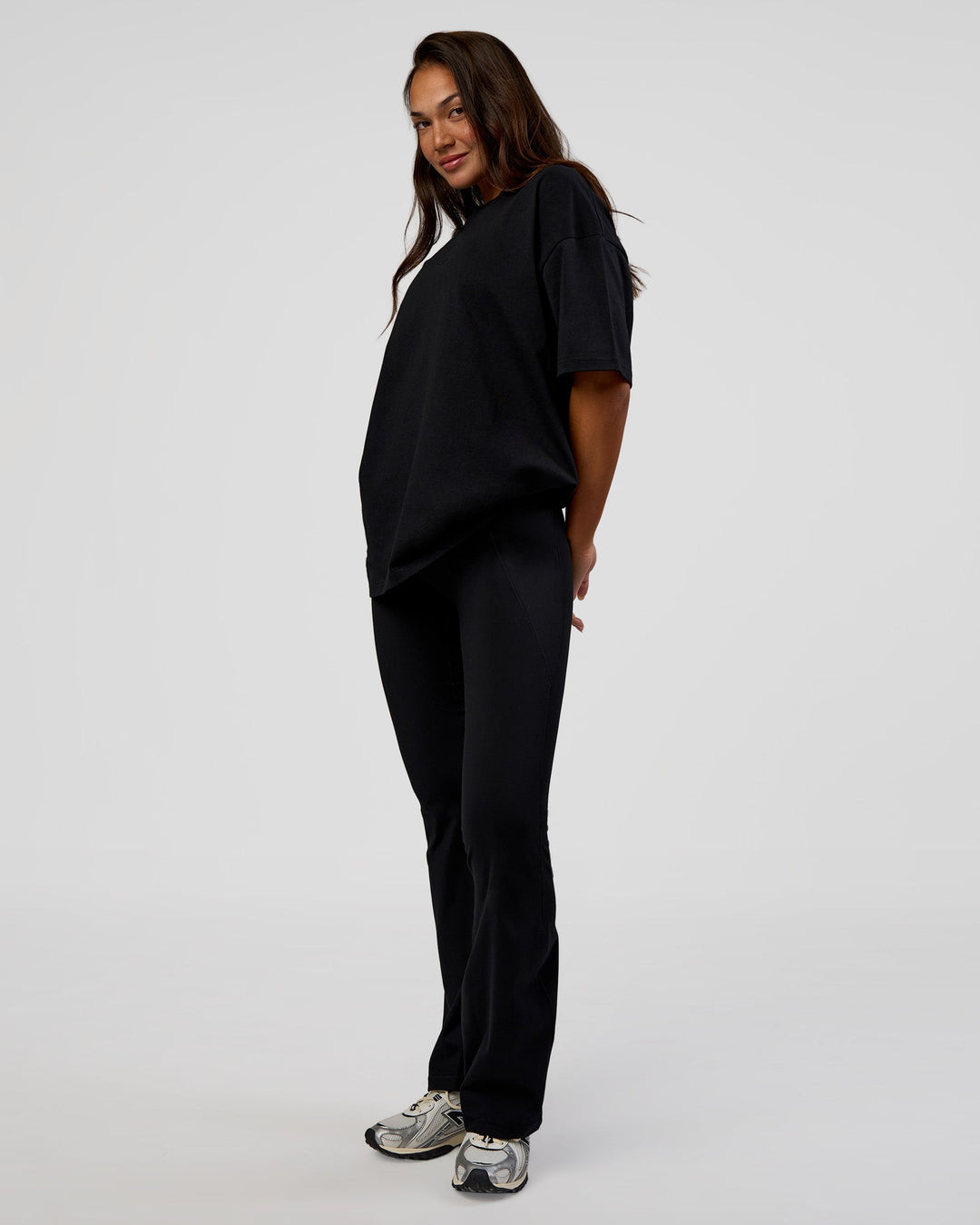 Woman wearing MVP 2.0 Oversized Tee - Black | Model:Kirstyn | Size:XS