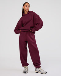 Woman wearing MVP Oversized Hoodie - Cherry Lacquer | Model:Brylee | Size:XS