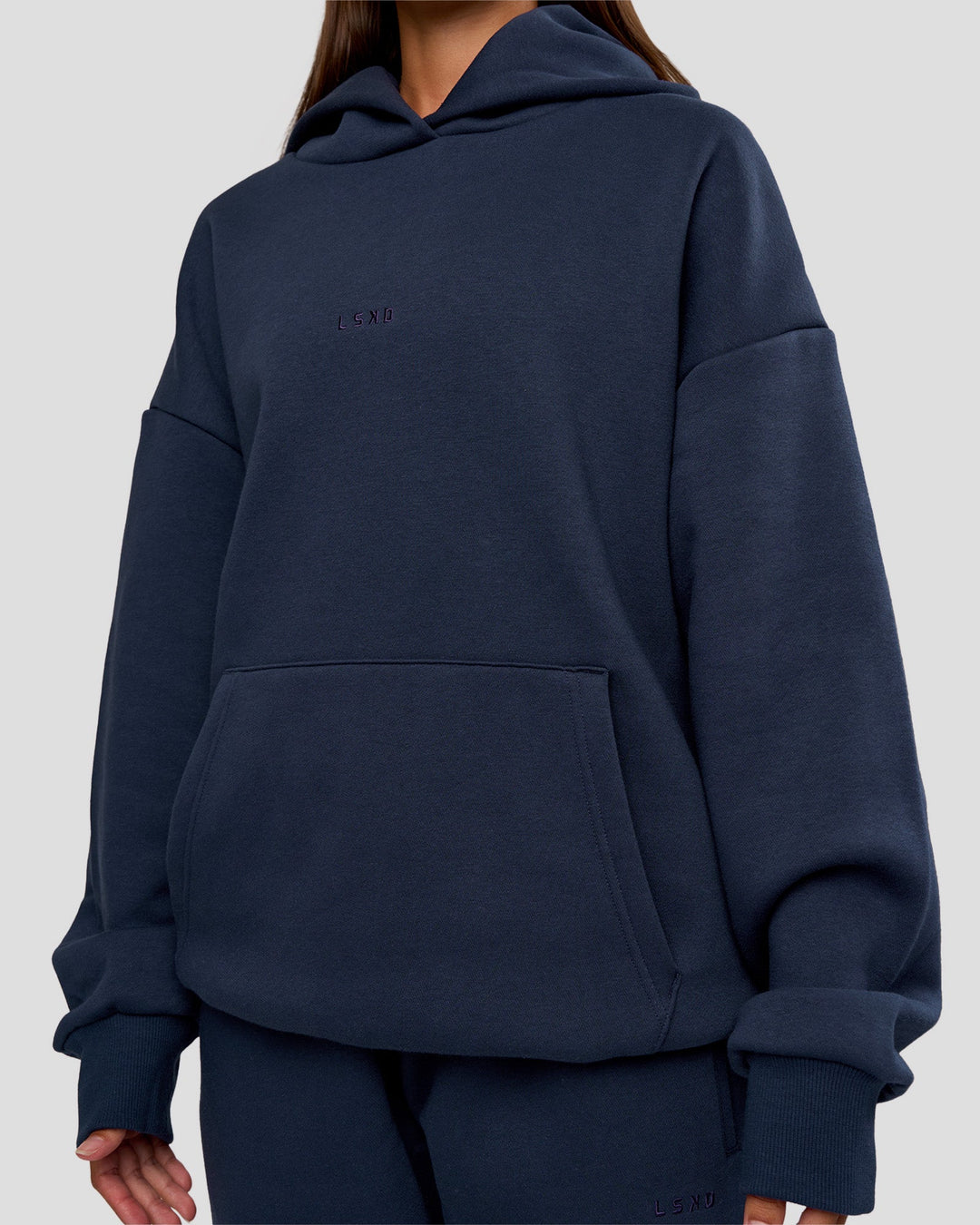 Woman wearing MVP Oversized Hoodie - Future Navy | Model:Brylee | Size:XS