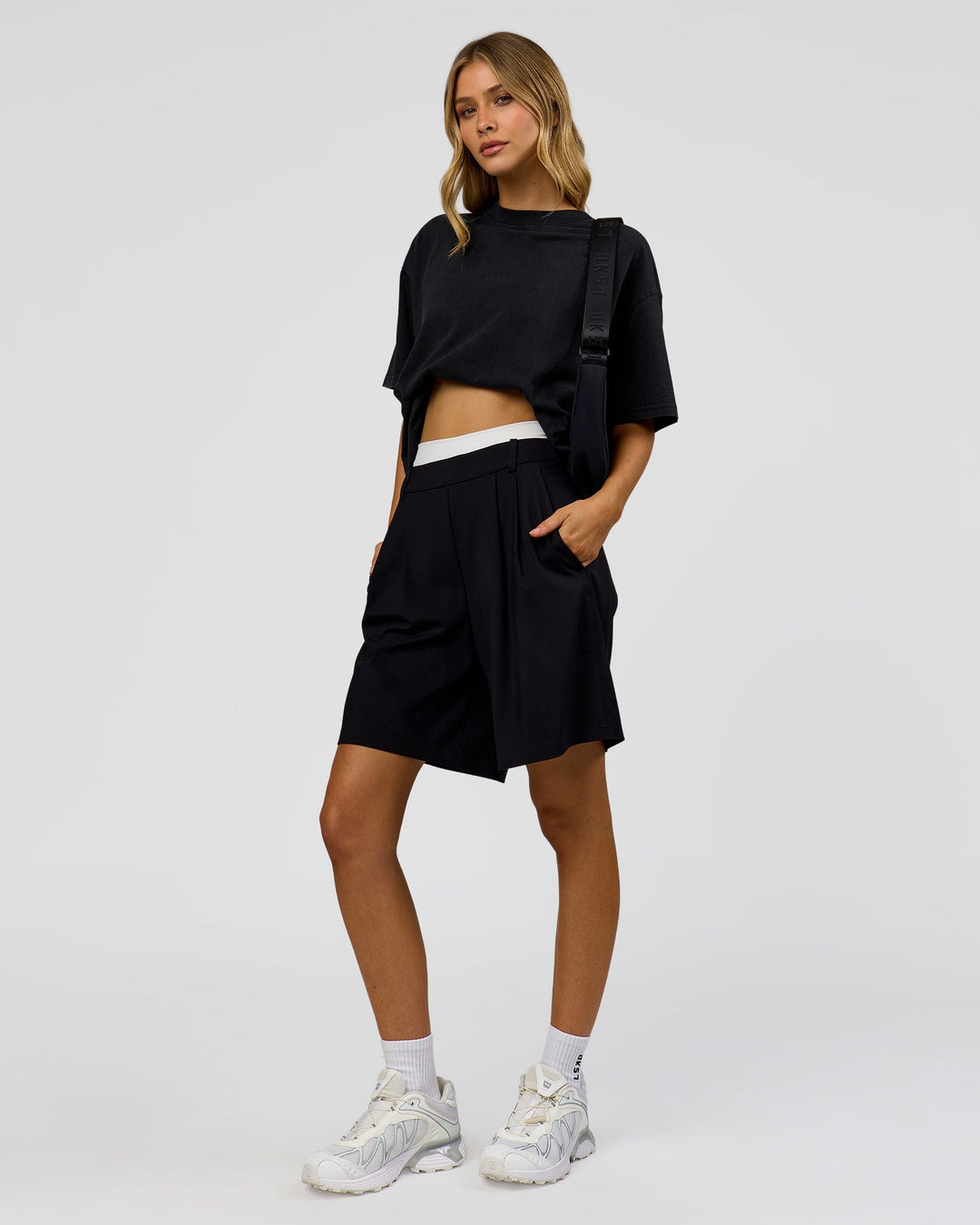 Woman wearing Memory in Motion Heavyweight Oversized Tee - Black Washed | Model:Leilani | Size:XS