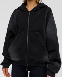 Woman wearing Memory in Motion Ultra Heavyweight Zip Thru Hoodie - Black Washed | Model:Leilani | Size:XS