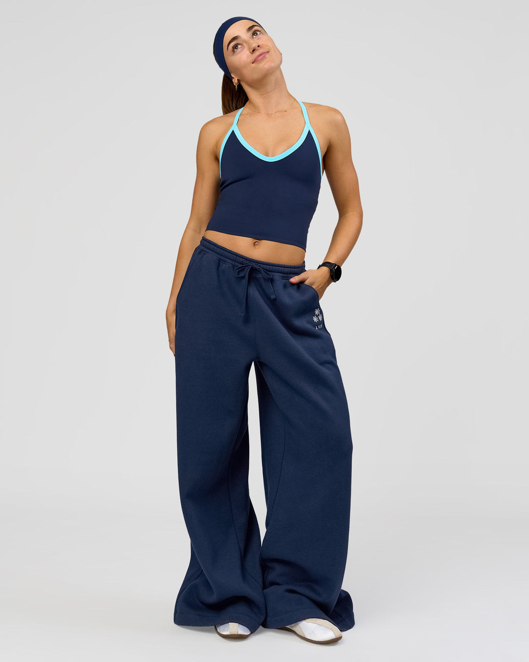 Woman wearing Milla Shelf Bra Tank - Future Navy-Baltic Sea | Model:Grace | Size:XS