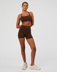Woman wearing Momentum Sports Bra - Hot Chocolate | Model:Charli | Size:XS | Thumbnail Index: 5