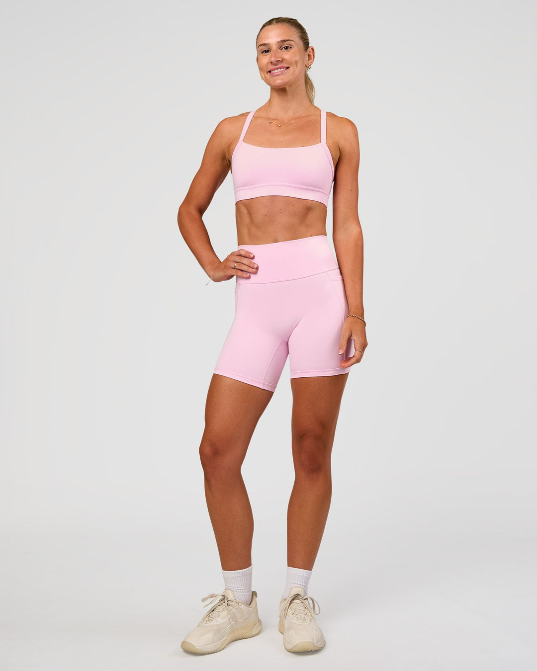 Woman wearing Momentum Sports Bra - Marshmallow | Model:Emelia | Size:XS