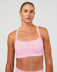 Woman wearing Momentum Sports Bra - Marshmallow | Model:Emelia | Size:XS