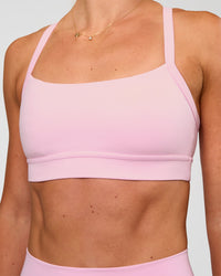 Woman wearing Momentum Sports Bra - Marshmallow | Model:Emelia | Size:XS