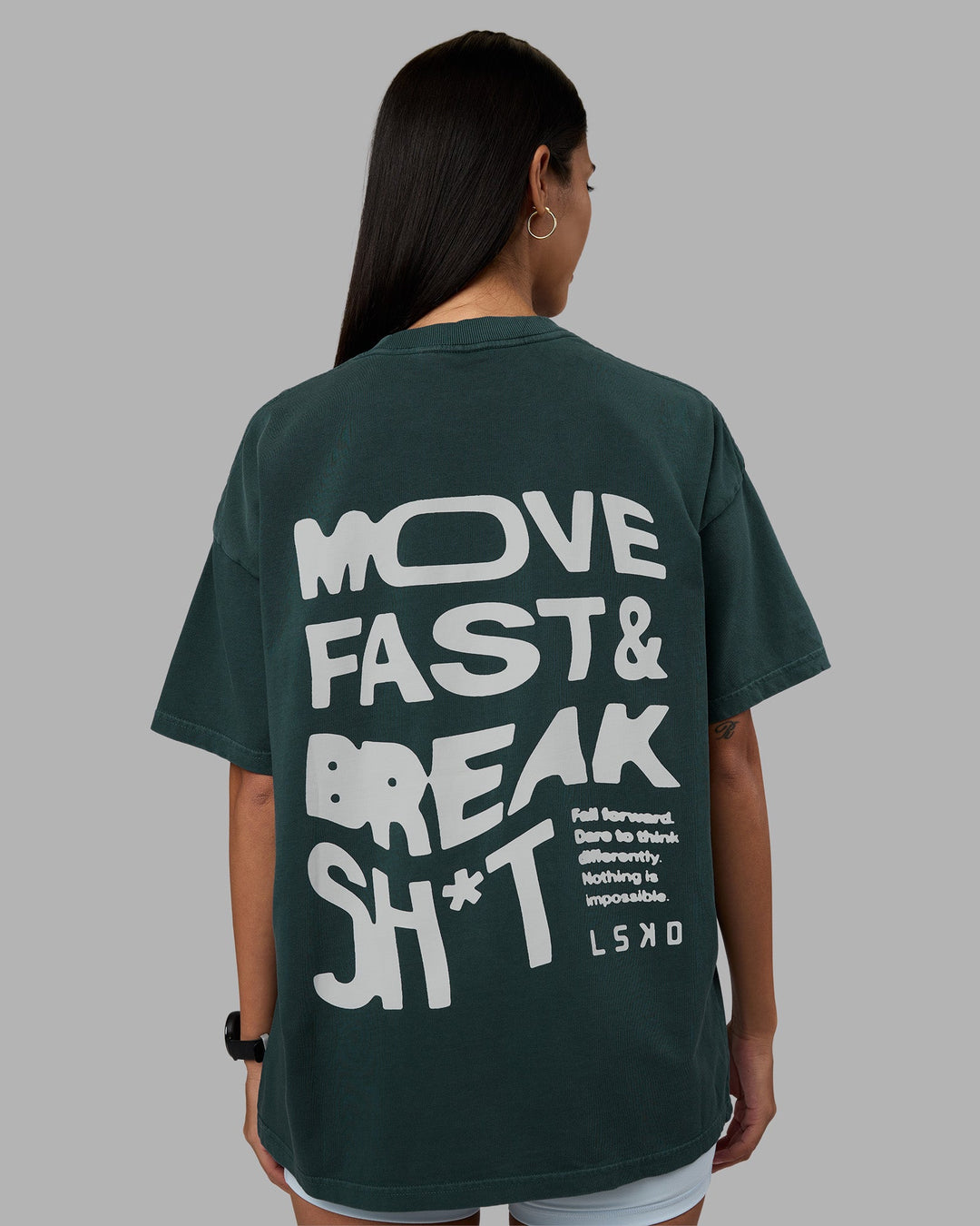 Woman wearing Move Fast Washed Heavyweight Tee Oversize - Deep Sea-White | Model:Rhiley | Size:XS