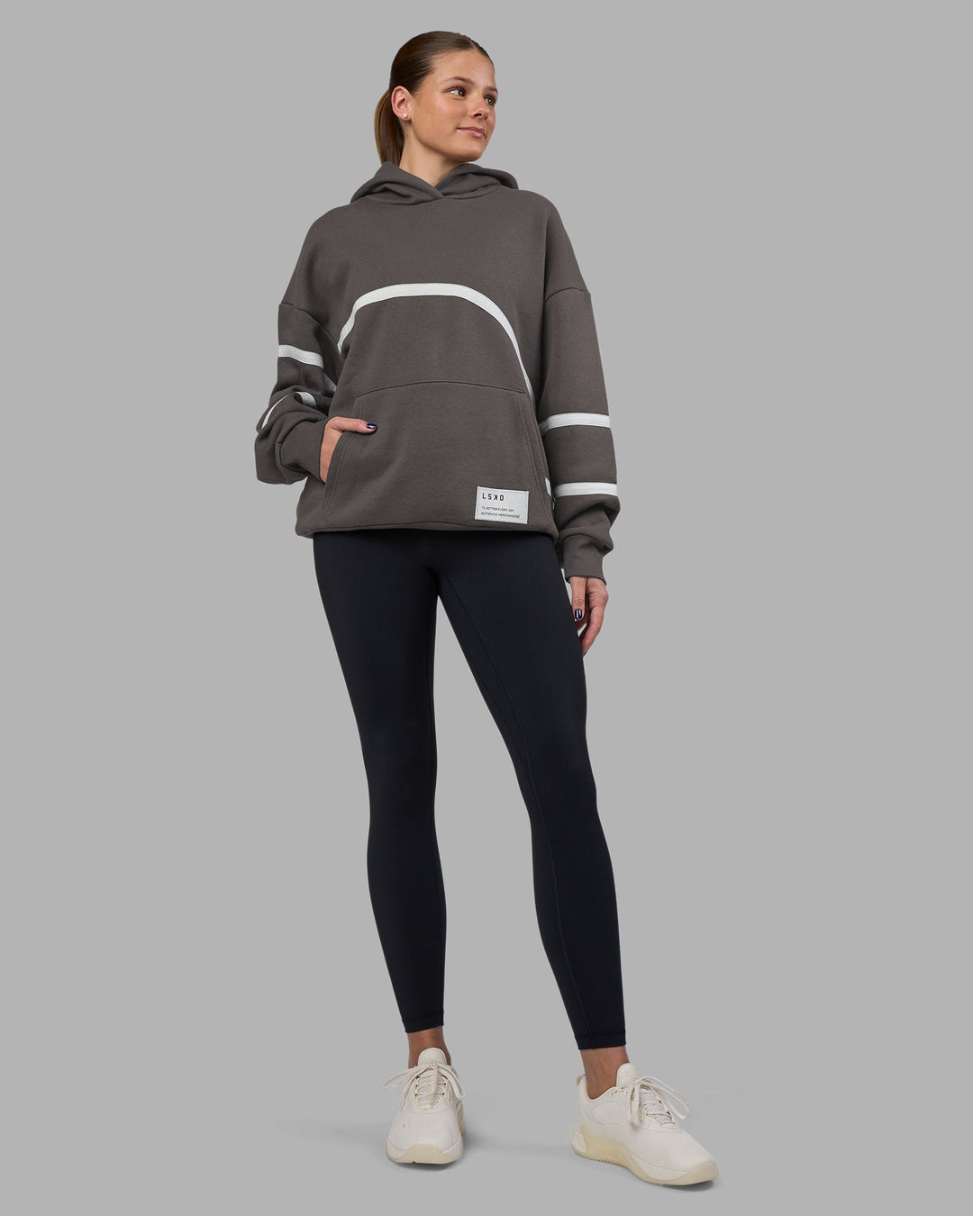 Woman wearing Movement Oversized Hoodie - Dark Storm-Digital Mist | Model:Phoebe | Size:XS
